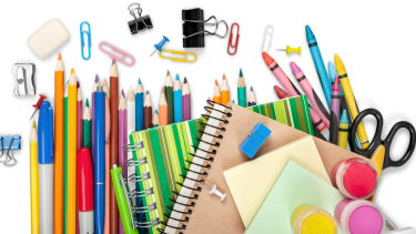 Flat lay image of pencils, paper clips, markers, scissors, notebook and other school supplies