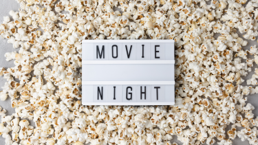 Popcorn with  "Movie Night" on board